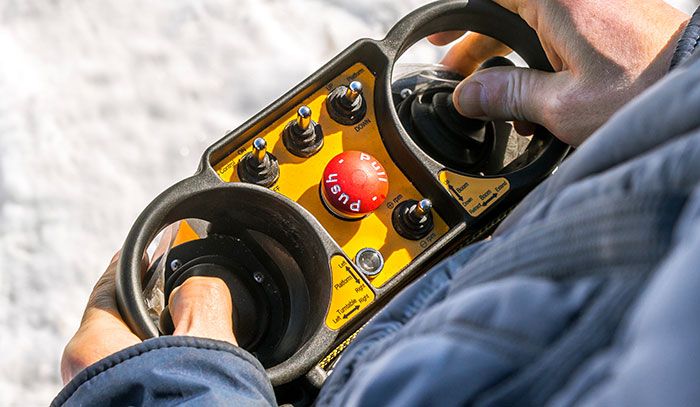 BC Crane Safety Crane operator using joystick controls