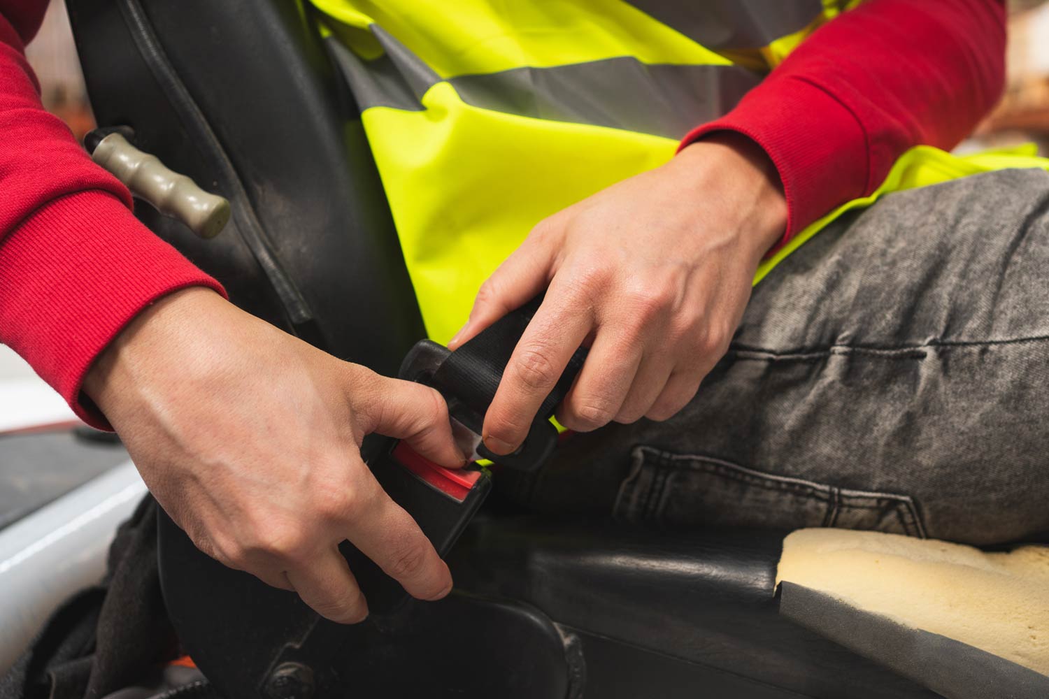 A worker using a seatbelt