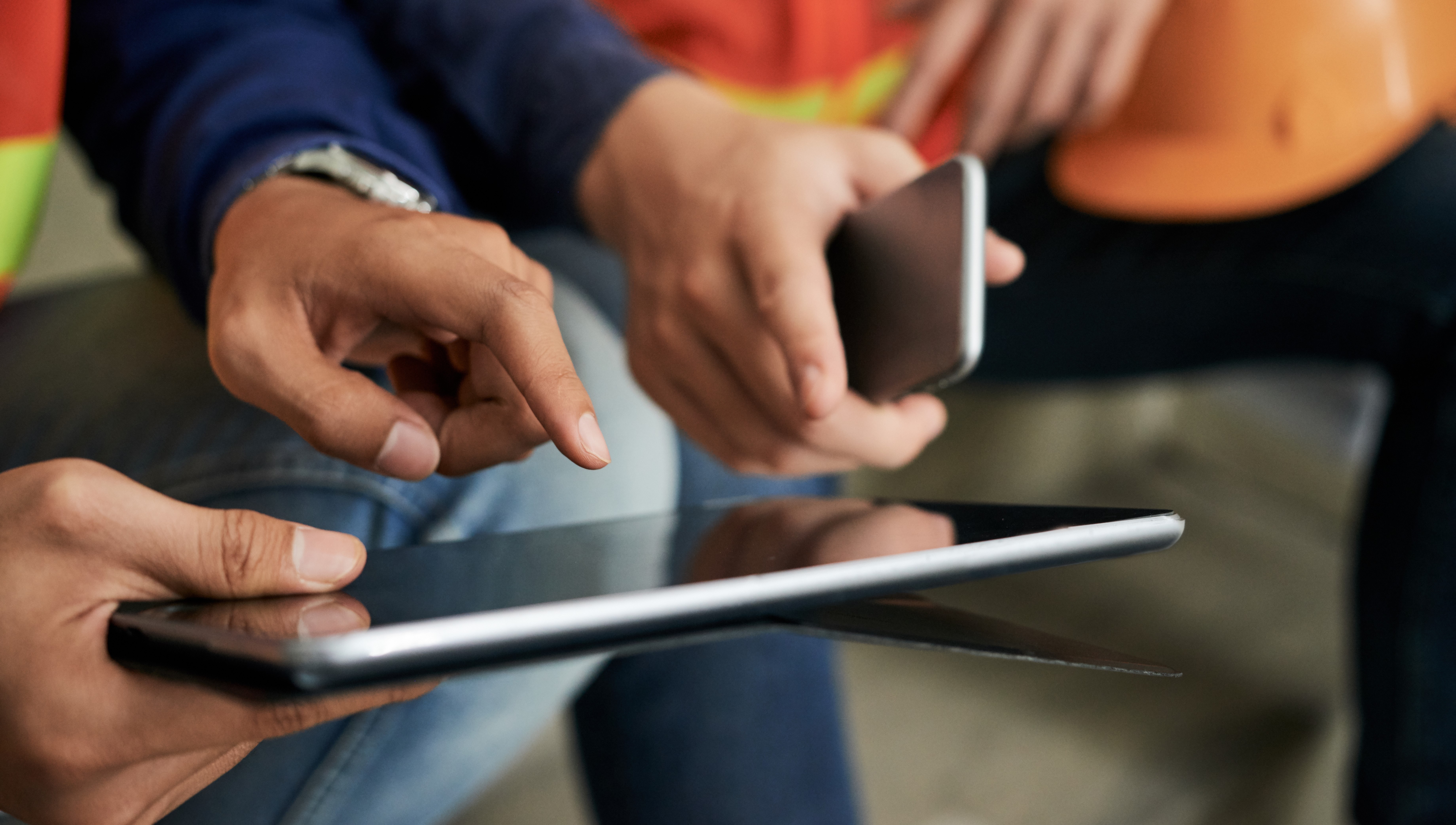 Crop engineers browsing tablet Crop engineers browsing tablet