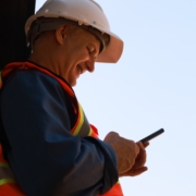 Man in high vis with phone cropped